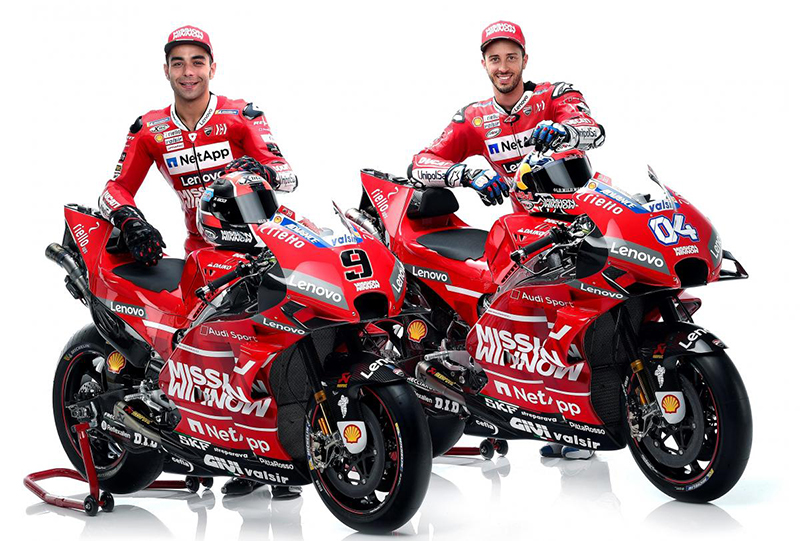 Et billede, der indeholder motorcykel, rød, udendørs, person
Automatisk genereret beskrivelse